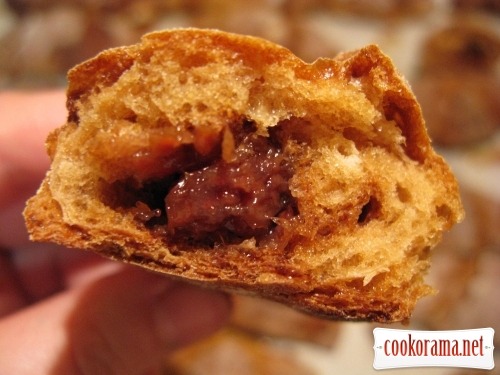 Croissants-bagels from cheese dough with raspberry filling