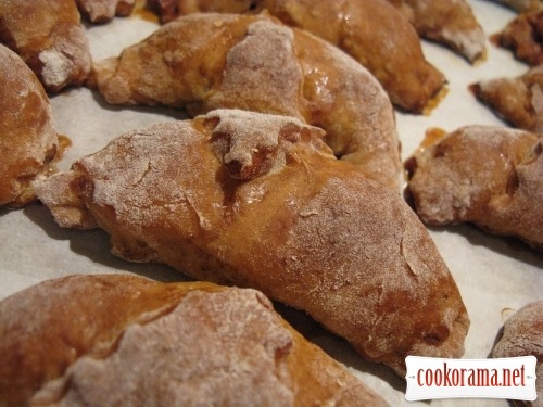 Croissants-bagels from cheese dough with raspberry filling