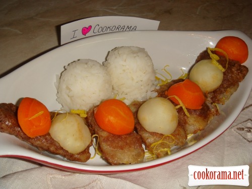 Hake in a nutty breading with vegetables