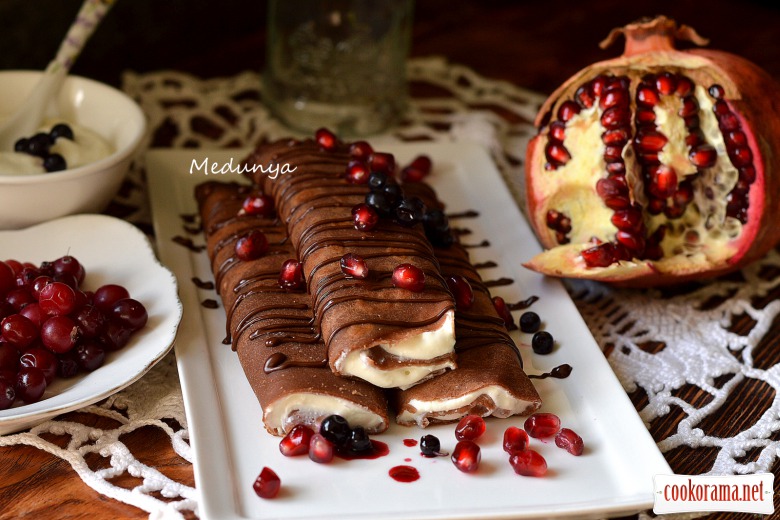 Coffee-chocolate pancakes with curd filling and chocolate sauce