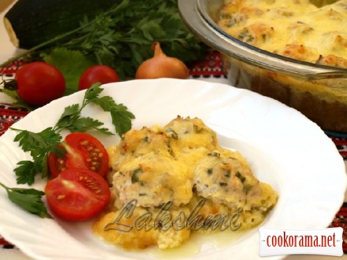 Zucchini Casserole with chicken meatballs on grape leaves