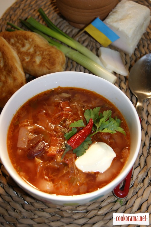 Ukrainian homemade borsch with dressing from lard and garlic