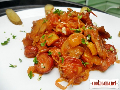 Sauerkraut stewed with vegetables, mushrooms, smoked sausage