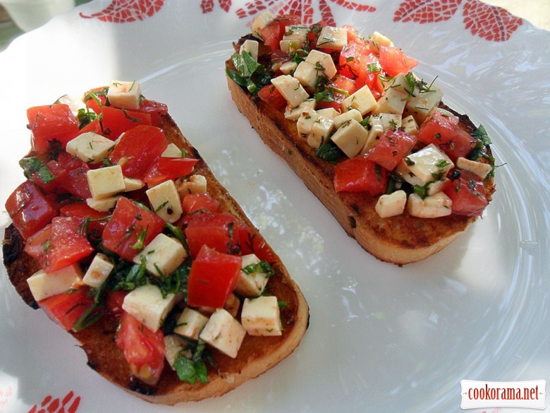 Bruschetta with cheese and tomatoes