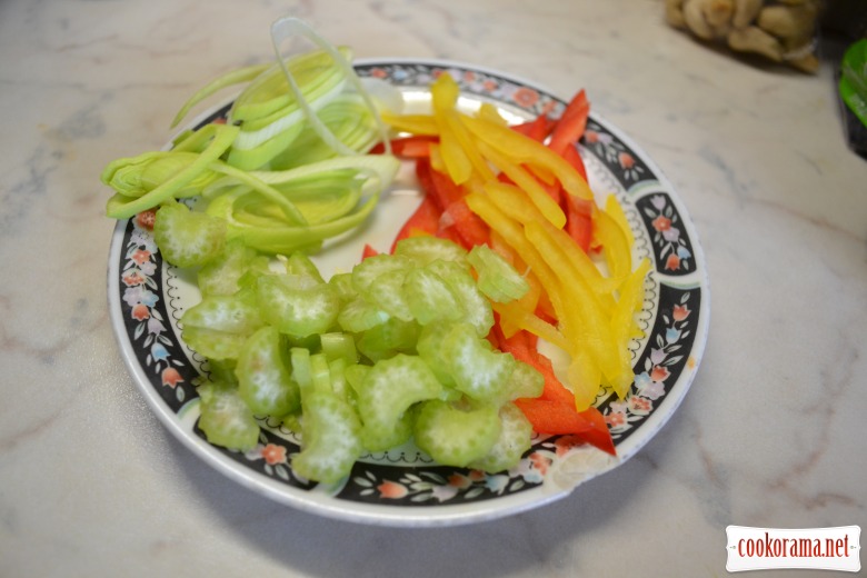 Seafood salad with rice Nerone, seasoned with pumpkin oil.