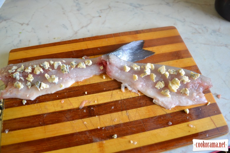 Sea bass baked with parmesan and Dor Blue.