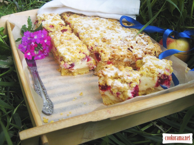 Cake with raspberries under white pudding