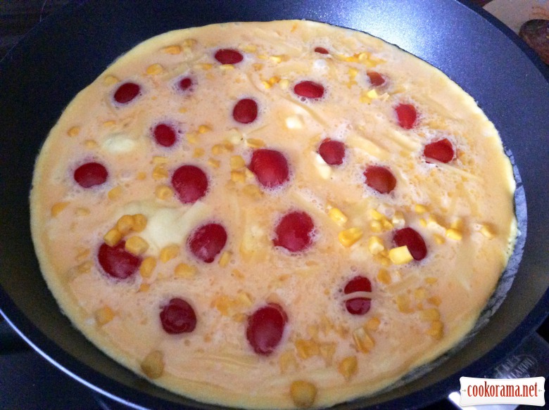 Omelette with cherry tomatoes and cheese