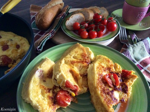 Omelette with cherry tomatoes and cheese