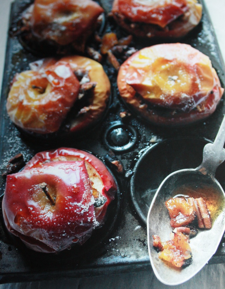 Baked apples with cinnamon, dried fruits, nuts and honey