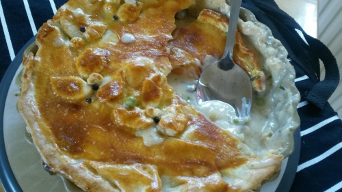 Pie from cheese pastry with chicken and mushrooms